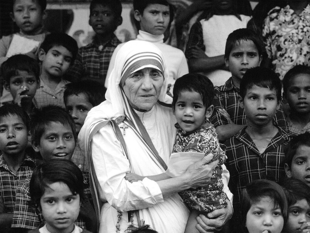 Mother Teresa with children. She clearly understood what it means to have empathy and respect for everyone.